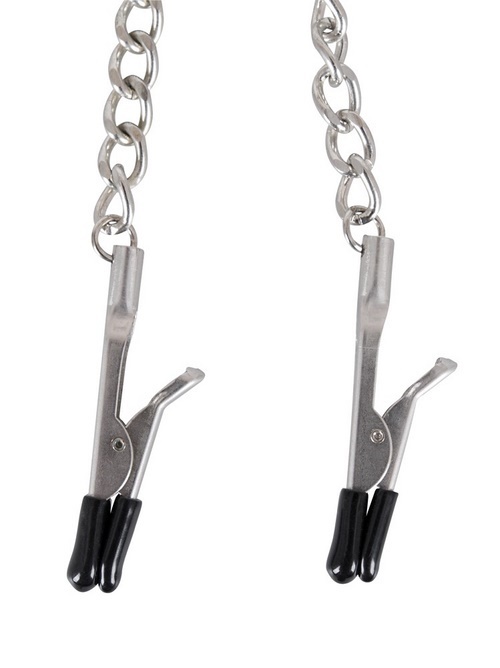 Y-shaped chain with nipple clamps and cock rings